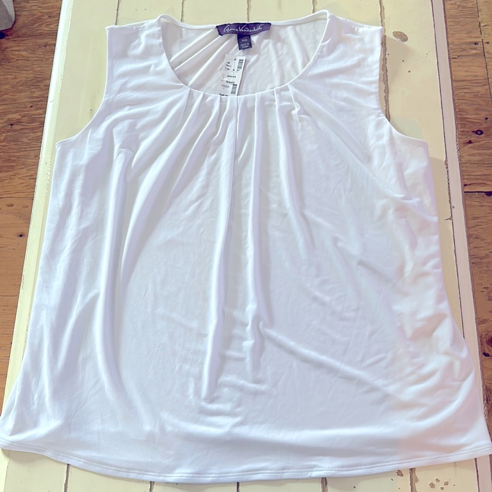 Woman’s new white sleeveless top size 18/20